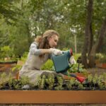 full-shot-woman-watering-garden-plants