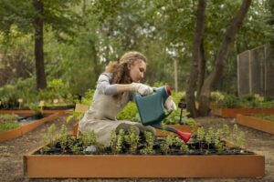 full-shot-woman-watering-garden-plants